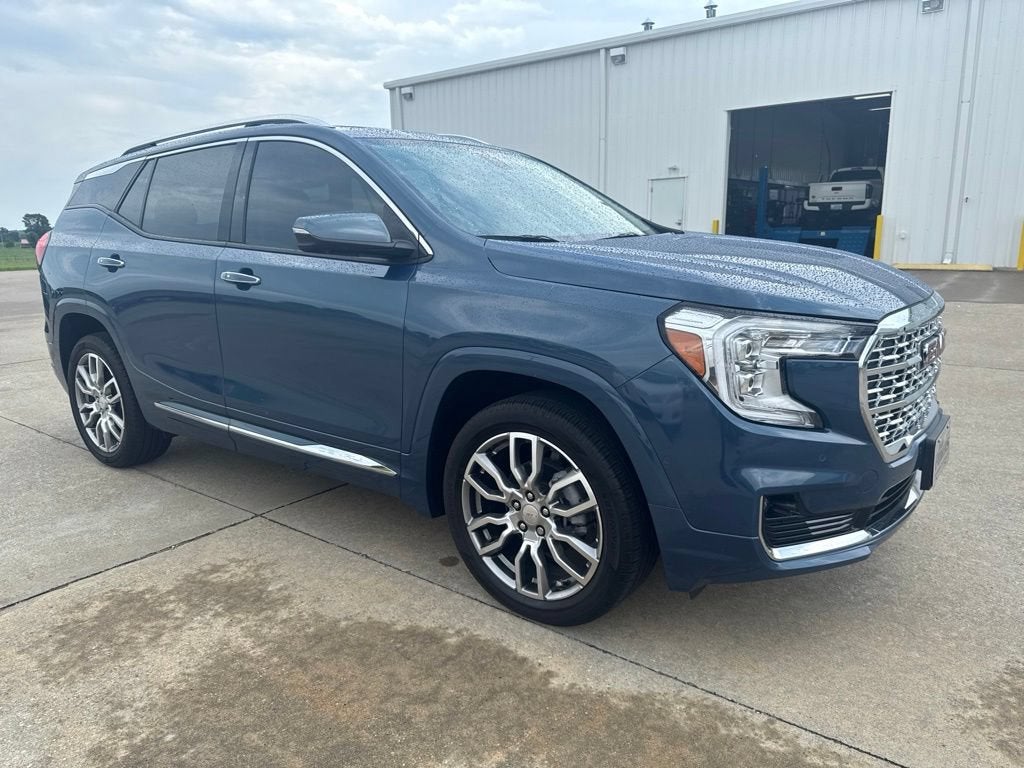2024 GMC Terrain Denali in Downpour Metallic — front three-quarter view