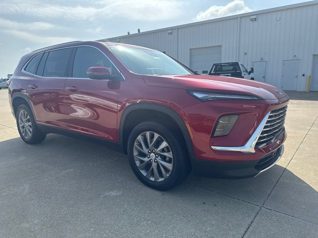 2026 Buick Enclave Preferred in Cherry Red Tintcoat — front three-quarter view