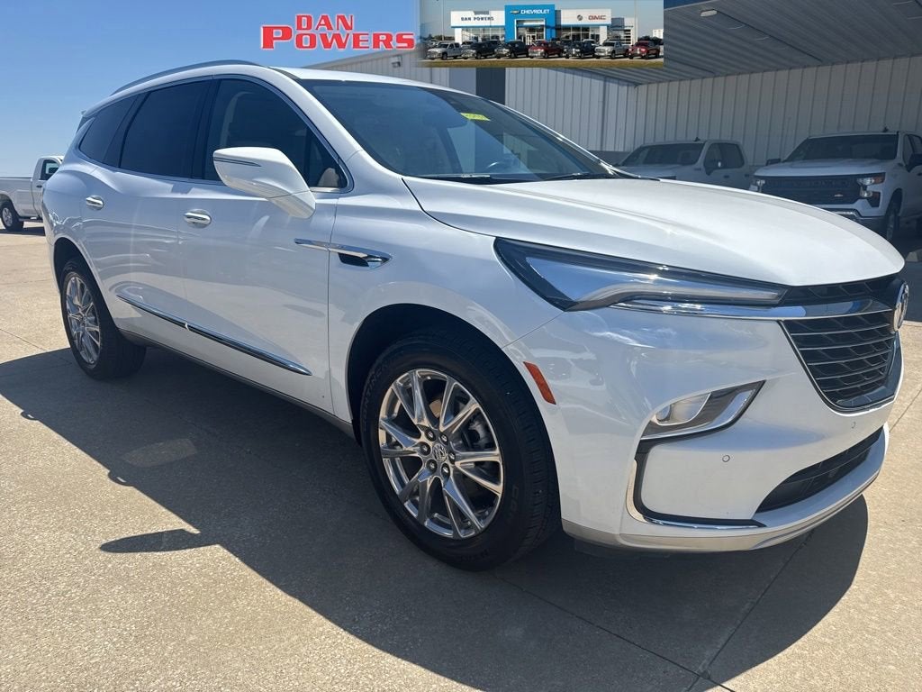 2024 Buick Enclave Essence in Summit White — front three-quarter view